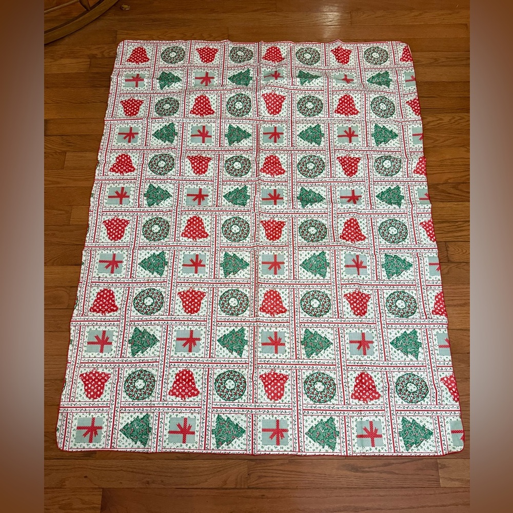 Beautiful vintage Christmas vinyl table cloth with Red and Green Patterns